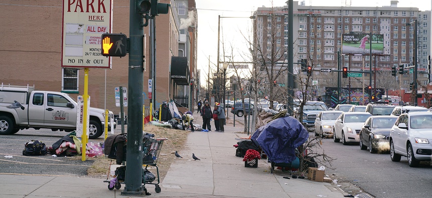 People experiencing homelessness tend to live in certain pockets of Denver’s downtown, including this section of Champa Street. This is also an area where people experiencing homelessness frequently encounter police.
