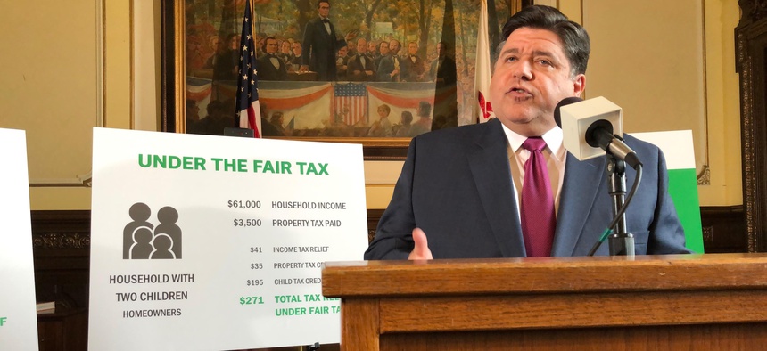 Gov. J.B. Pritzker outlines his plan to replace Illinois' flat-rate income tax with a graduated structure, during a state Capitol news conference on Thursday, March 7, 2019 in Springfield.