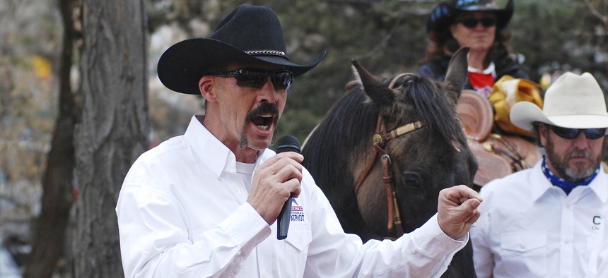 Cibola County Sheriff Tony Mace rallies protesters against gun control legislation at a gathering outside the New Mexico state Capitol, on March 12, 2019.