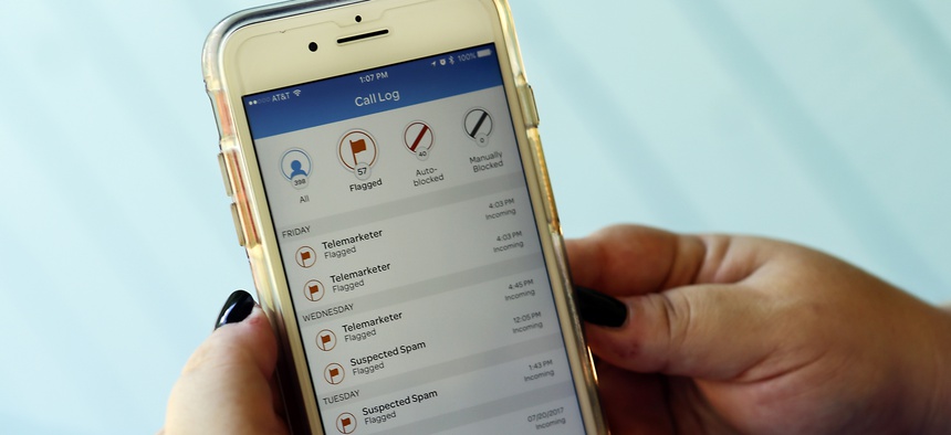 This Aug. 1, 2017, file photo, shows a call log displayed via an AT&T app on a cellphone in Orlando, Fla. New tools are coming to help fight robocall scams, but don’t expect unwanted calls to disappear.