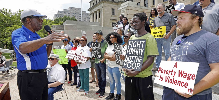 Protesters at the Mississippi Capitol in Jackson, in June 2018, gathered to demand lawmakers and statewide elected officials address the need for union rights, living wages, fully funded anti-poverty programs and support of public education.