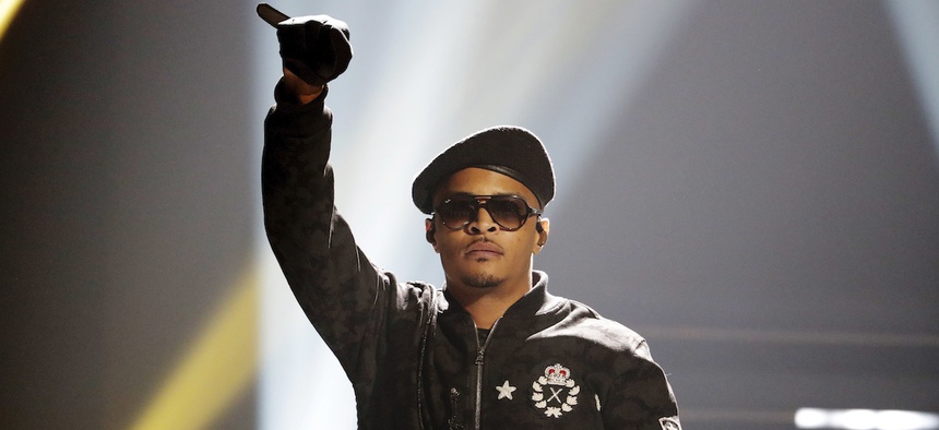 T.I. performs during the BET Hip Hop Awards in Atlanta in 2016. The rapper said he accompanies his teenage daughter to the doctor to confirm the presence of her hymen.