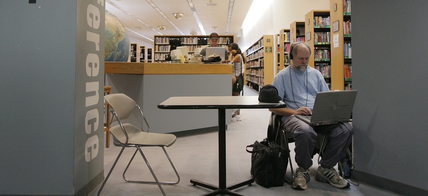 Jeff Quitney, 50, surfs the internet using free Wi-Fi service at the Las Vegas Library in Las Vegas, Monday, Sept. 10, 2007.