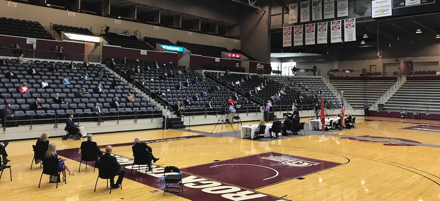 The 100-member Arkansas House met on Thursday in the basketball arena at the University of Arkansas for a special session instead of the Capitol because of concerns about COVID-19, Speaker Matthew Shepherd said. (AP Photo/Andrew Demillo)