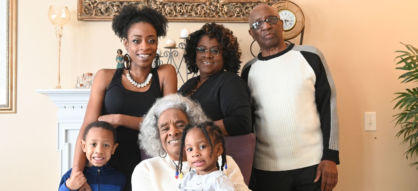 The Walker family ― (standing from left) Michael "Amir" Nimrod, Andre'a Walker-Nimrod, Wilma Walker, Howard Walker, (seated) matriarch Evelyn Whitfield and Maleeya Nimrod―all live together in Florissant, Missouri.