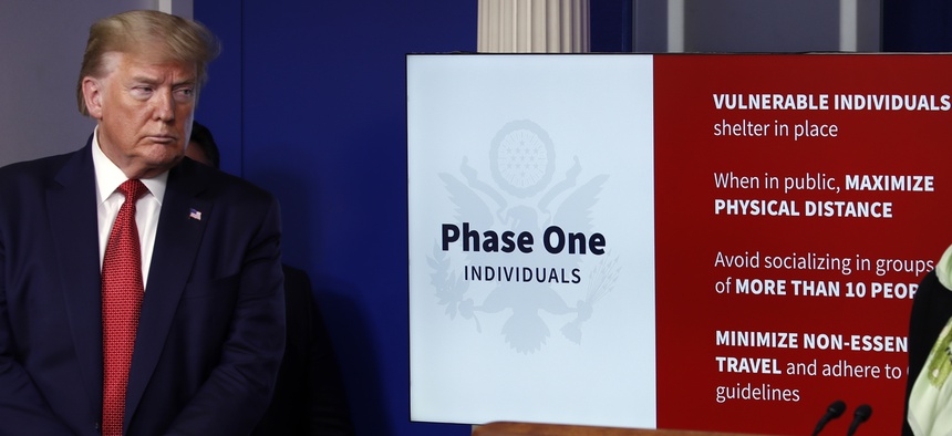 President Donald Trump listens as Dr. Deborah Birx, White House coronavirus response coordinator, speaks about the coronavirus in the James Brady Press Briefing Room of the White House, Thursday, April 16, 2020, in Washington.
