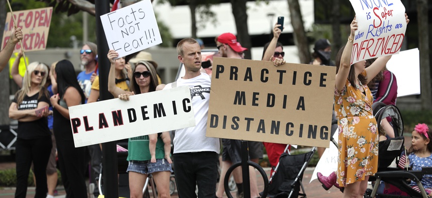 Protesters in Florida showed a deep suspicion of efforts to shut down daily life to slow the spread of the coronavirus.