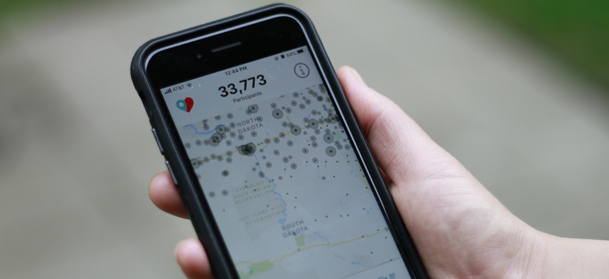 The Care19 app is seen on a cell phone screen, Friday, May 22, 2020, in Sioux Falls, S.D. Care19, a contact tracing app is being pushed by the governors of North Dakota and South Dakota as a tool to trace exposure to the coronavirus.