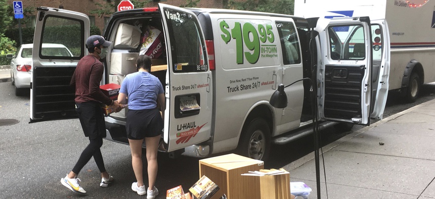 People load a moving van in New York City on Sept. 2, 2020.