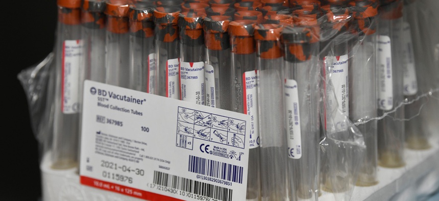 Empty collection vials are stored for the NIH-funded Moderna Covid-19 vaccine third phase clinical trail wait to be processed in the specimen processing lab at the University of Miami Miller School of Medicine on Sept. 2, 2020.