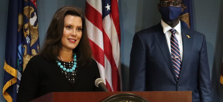 In this photo provided by the Michigan Office of the Governor, Gov. Gretchen Whitmer addresses the state during a speech in Lansing, Mich., Thursday, Sept. 10, 2020.