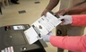 An incarcerated person casts his ballot for the March 17, Illinois primary at the jail in Chicago.