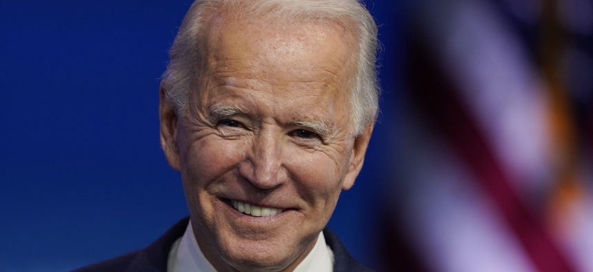 President-elect Joe Biden pauses as he listens to media questions at The Queen theater, Tuesday, Nov. 10, 2020, in Wilmington, Del.