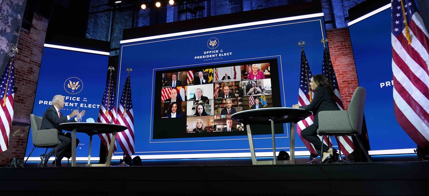 President-elect Joe Biden and Vice President-elect Kamala Harris participate in a meeting with the National Governors Association's executive committee at The Queen theater, Thursday, Nov. 19, 2020, in Wilmington, Del.