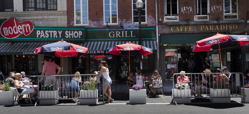 Outdoor dining in Boston. The pandemic has led to many innovations like closing public streets to expand outdoor dining. Government agencies should continue to identify creative programs and services during this crisis and beyond.