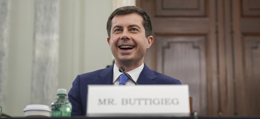 Transportation Secretary nominee Pete Buttigieg smiles during a Senate Commerce, Science and Transportation Committee confirmation hearing on Capitol Hill, Thursday, Jan. 21, 2021, in Washington.