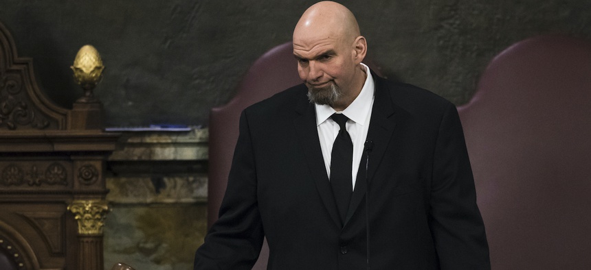 Lt. Gov. John Fetterman gavels in a joint session of the Pennsylvania House and Senate before Democratic Gov. Tom Wolf delivers his budget address for the 2019-20 fiscal year, Harrisburg, Pa., Tuesday, Feb. 5, 2019.